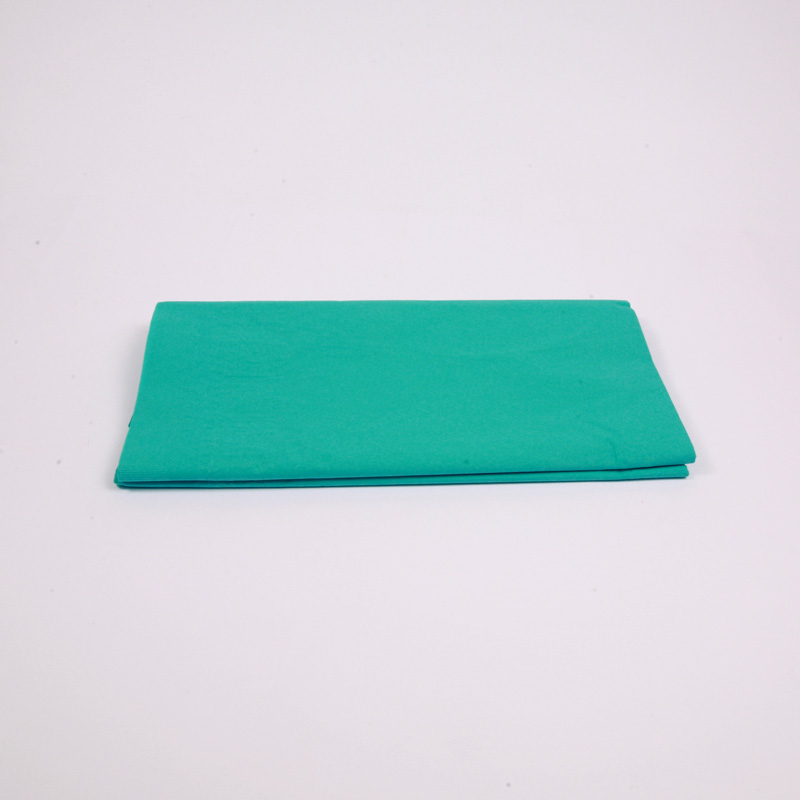 Turquoise paper table cover